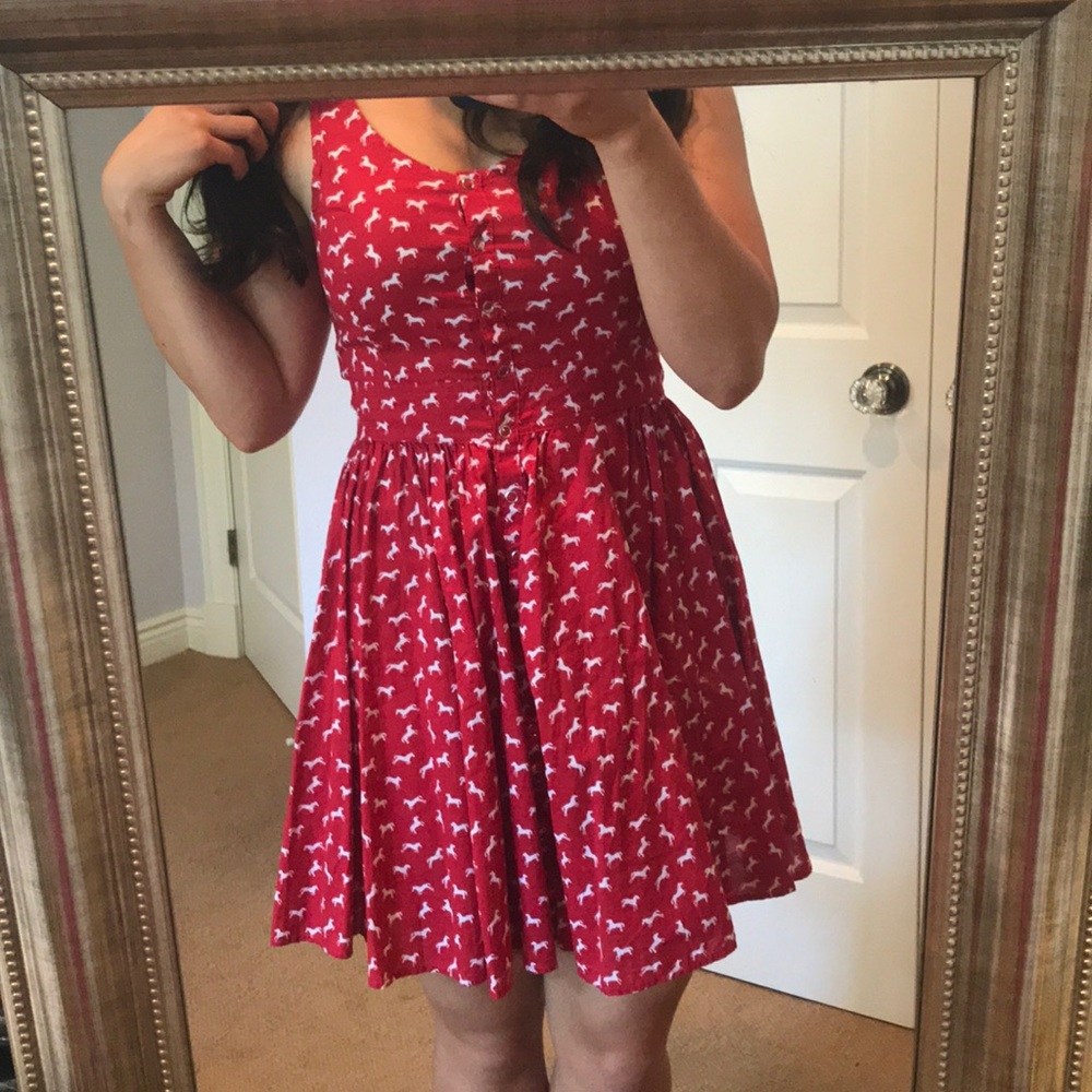 Red button-front dress w/ leaping horse pattern